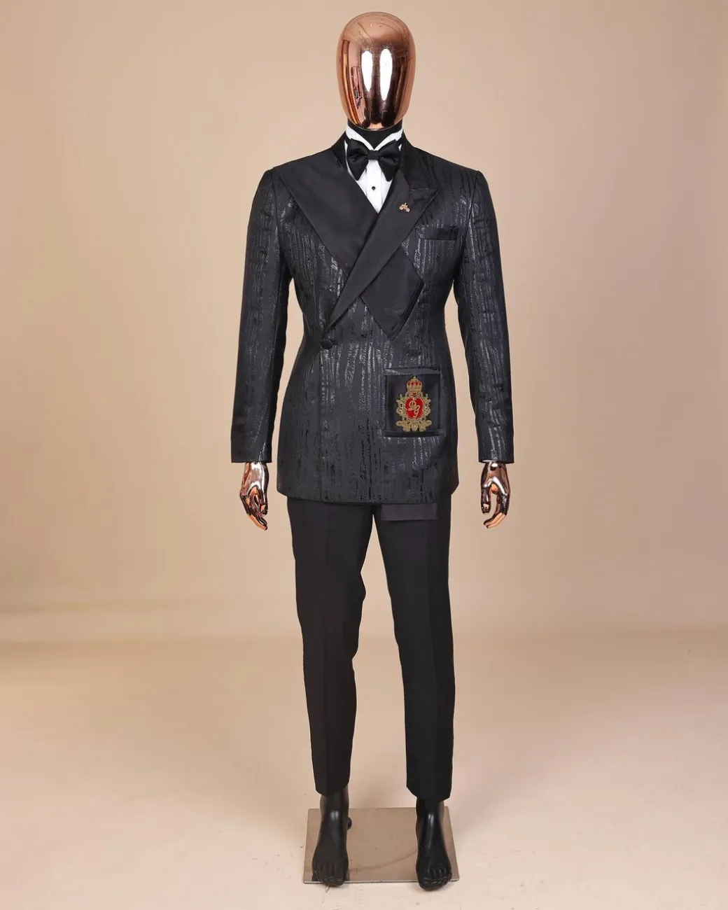 The “Da Vinci” charcoal black, metallic jacquard, single lapel, mid cut intersect strap tuxedo suit.