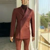 The dark “chocolate” brown monochrome double breasted suit