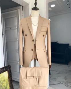 The “Diego Maradona” monochrome Champagne Gold peak lapel business suit