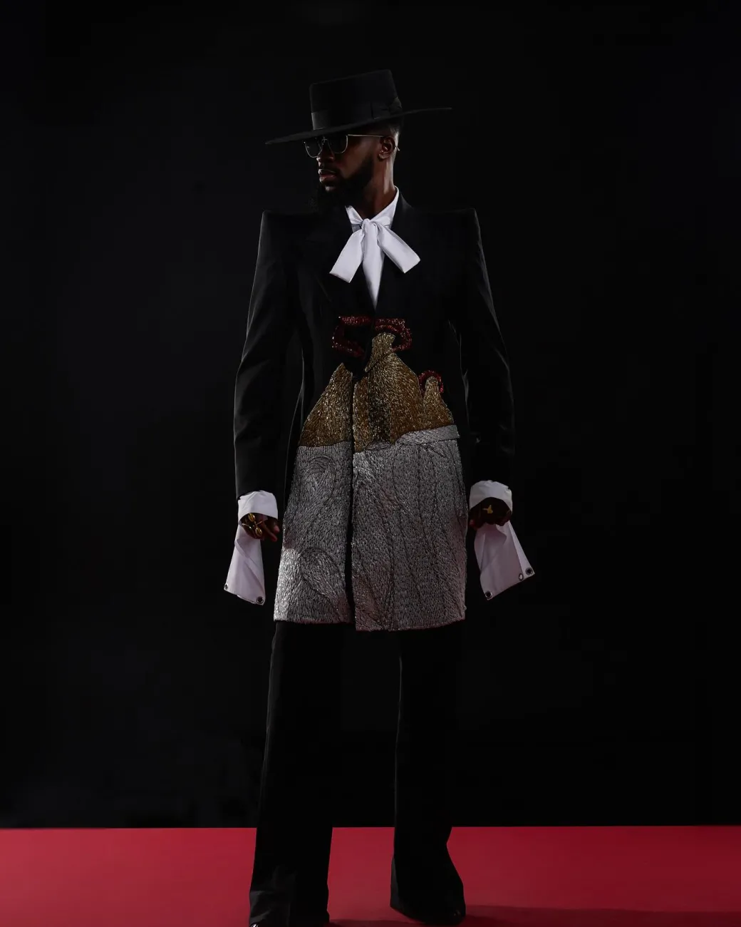 The “Eyo” Suit.