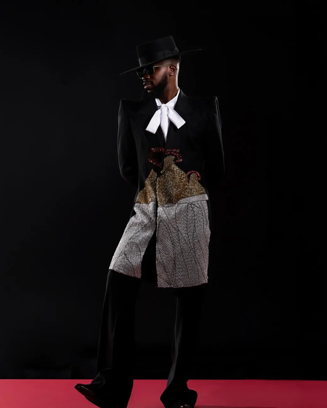 The “Eyo” Suit.