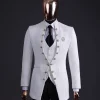 The “Monaco” ivory white plunged jacquard, single button front cut layered suit