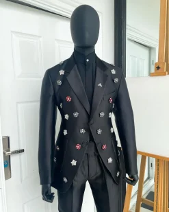 The Monochrome “okorodudu” mikado satin charcoal black notch lapel suit