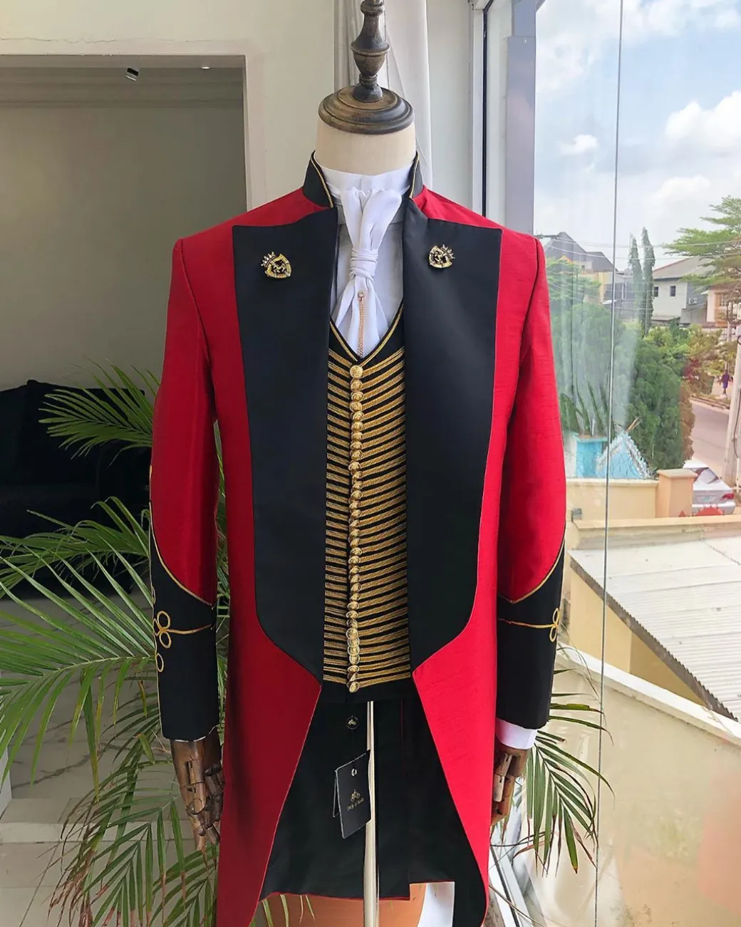 The “showman” Maroon trench silk costume suit.