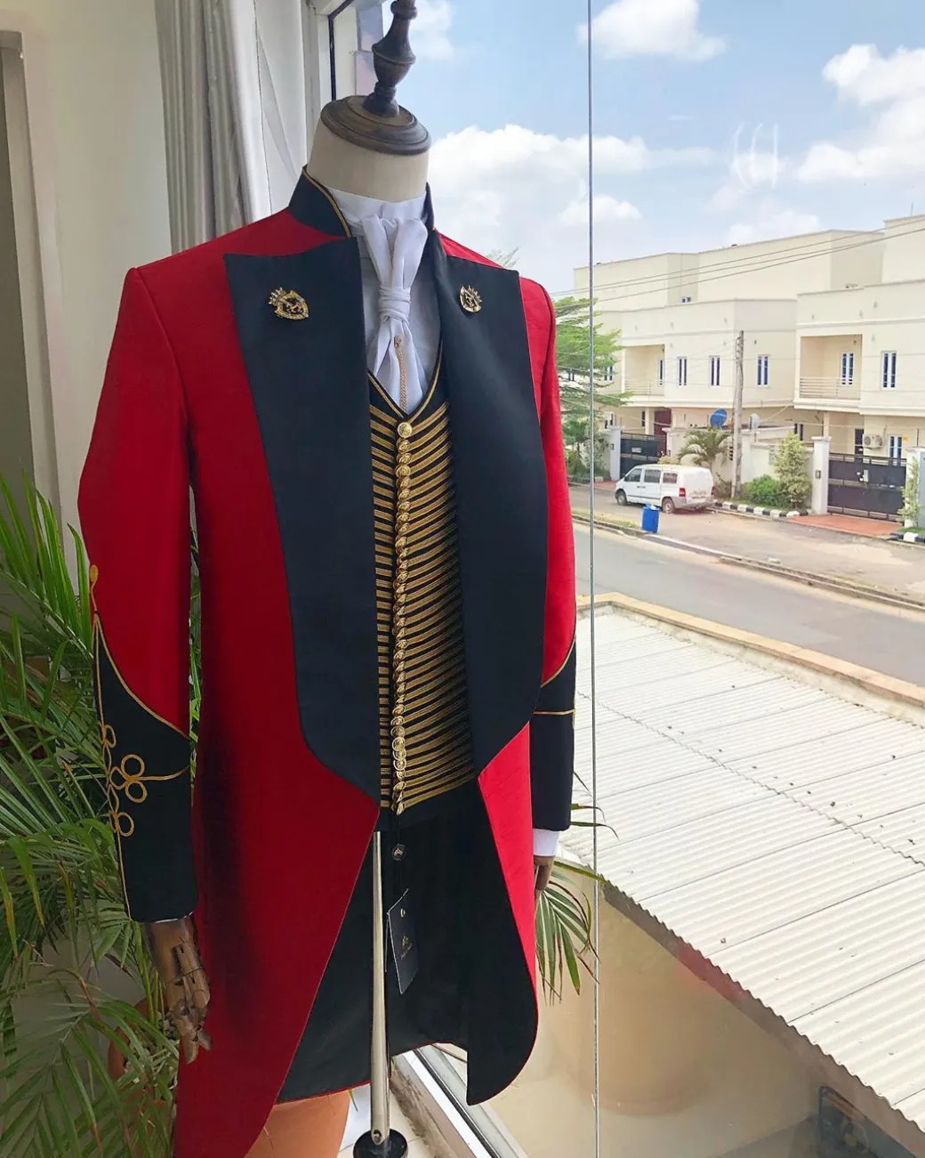 The “showman” Maroon trench silk costume suit.