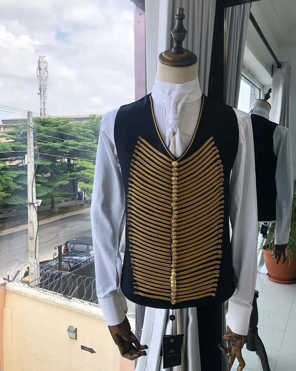 The “showman” Maroon trench silk costume suit.