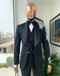The “Trailblazers” charcoal black, shawl lapel tuxedo suit with metallic silver adornments