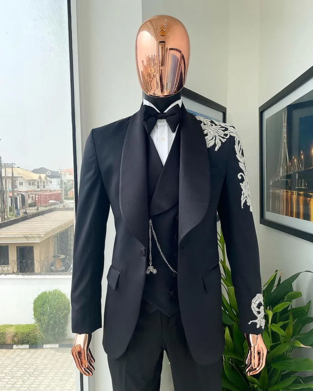 The “Trailblazers” charcoal black, shawl lapel tuxedo suit with metallic silver adornments