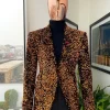 The “Young and Restless” fire orange peak lapel suit