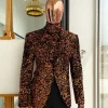 The “Young and Restless” fire orange peak lapel suit