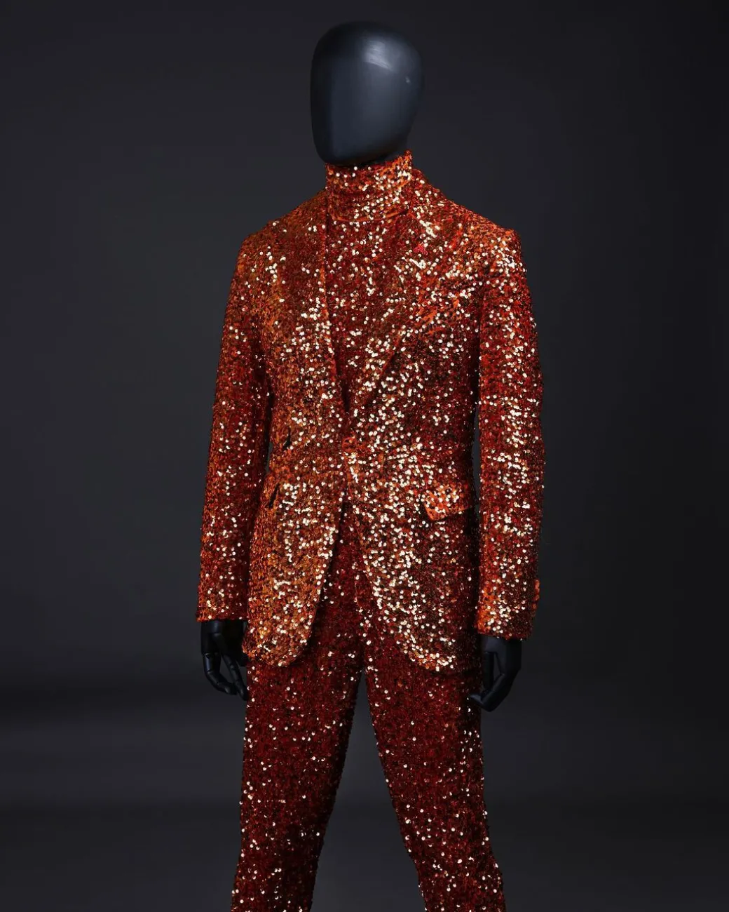 The “Young and Restless” fire orange peak lapel sequin suit.