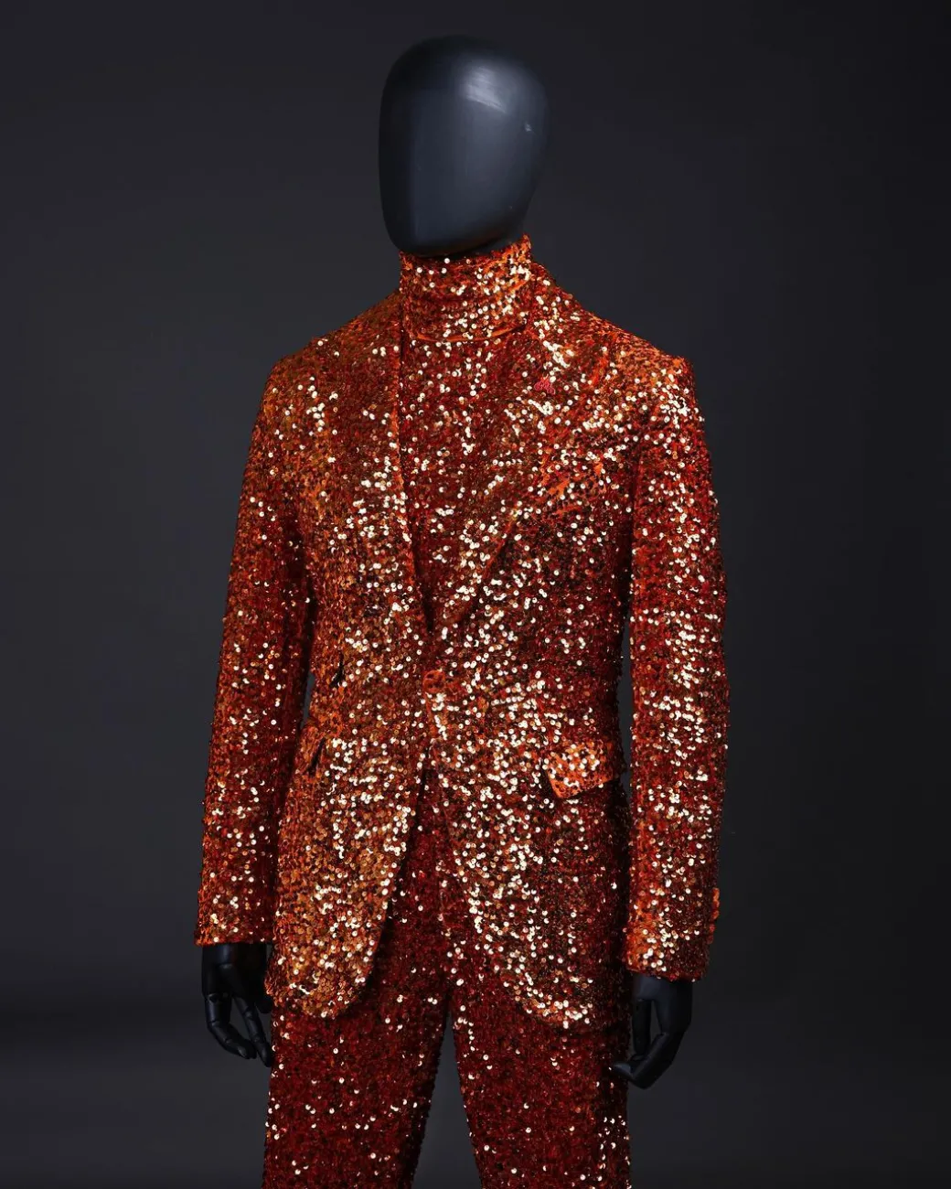 The “Young and Restless” fire orange peak lapel sequin suit.