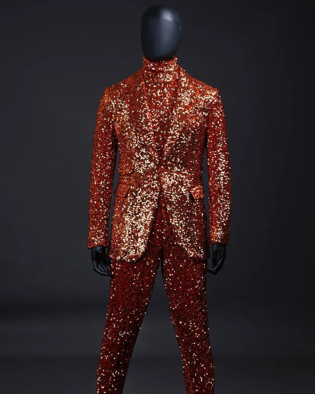 The “Young and Restless” fire orange peak lapel sequin suit.